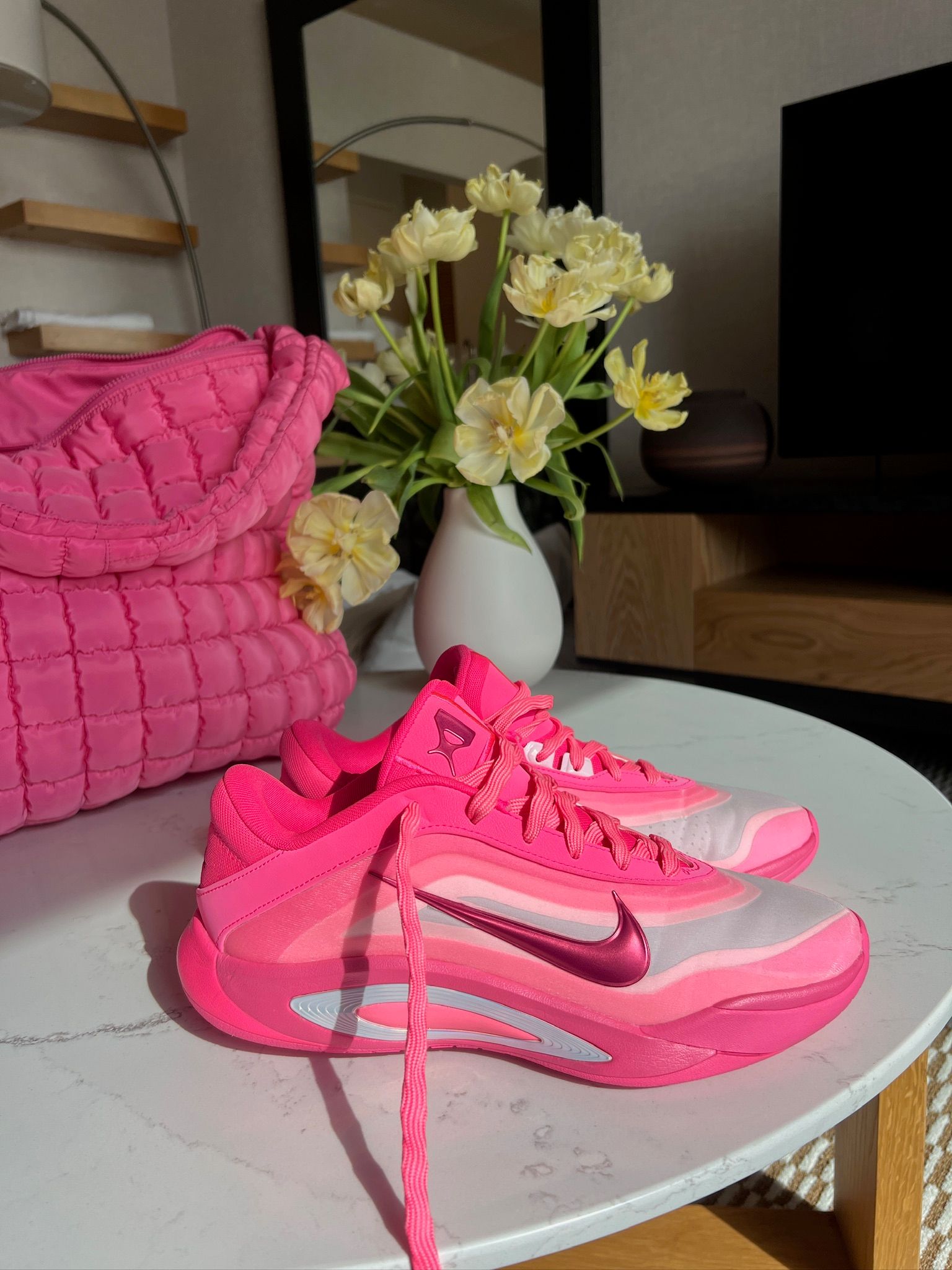 Image may contain Clothing Footwear Shoe Sneaker Flower Flower Arrangement Plant and Flower Bouquet