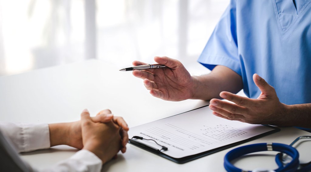 Female consulting a doctor about stem cell therapy